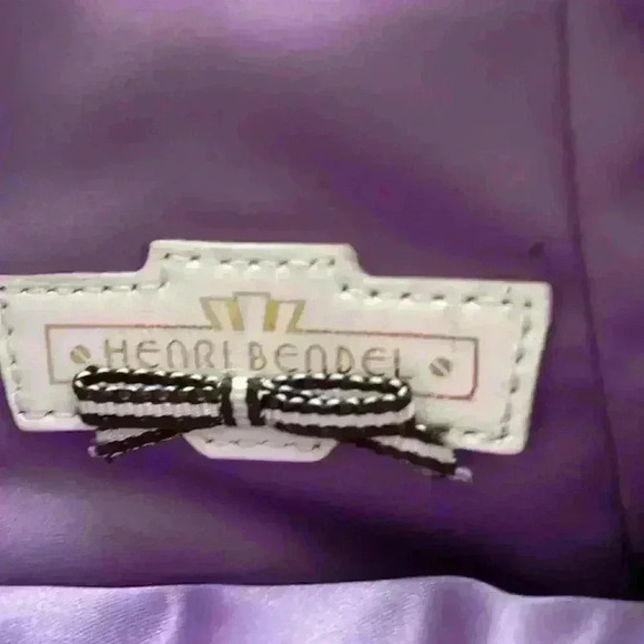 Beautiful Henri Bendel bronze wristlet with purple interior - Picture 4 of 4